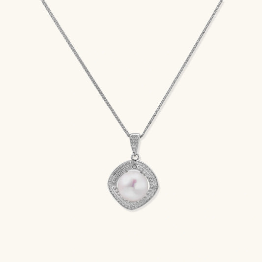 Necklace with a pendant featuring a pearl on a white background