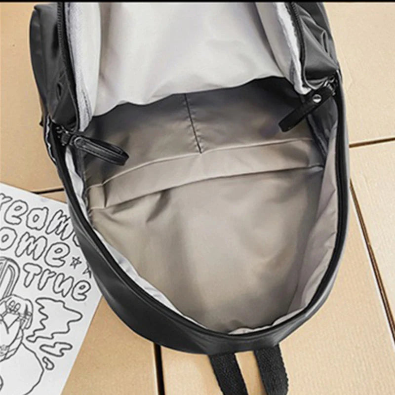 Sleek Leather Zip Backpack
