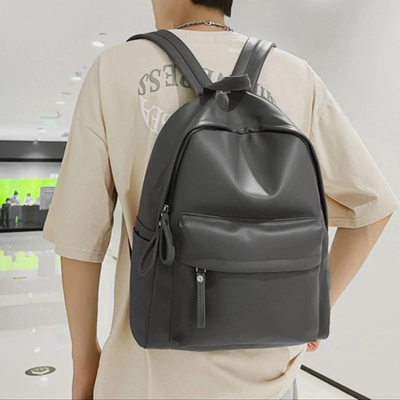 Sleek Leather Zip Backpack